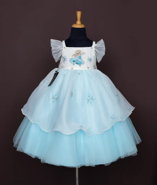 Blue kids' gown with Frozen princess embroidery, layered net design, and snowflake motifs.