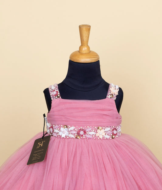 Side view of baby girl pink frock with flower belt and layered tulle skirt – party wear dress