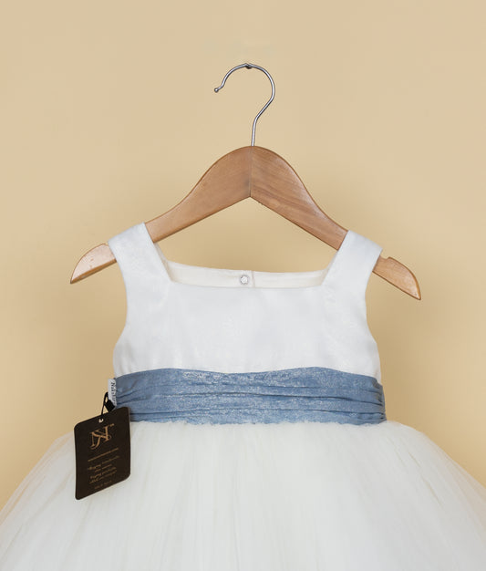 Back view of white baby dress with decorative blue bow and sash detail - Kids formal wear back design