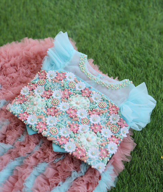Elegant baby girl party dress featuring flower print top and voluminous fur skirt