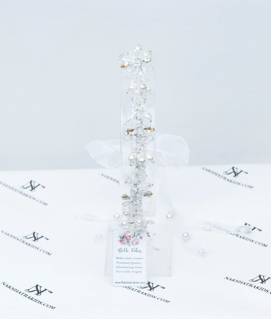 Close-up of the hair crown showing the intricate pearl and shimmering crystal floral-inspired design details