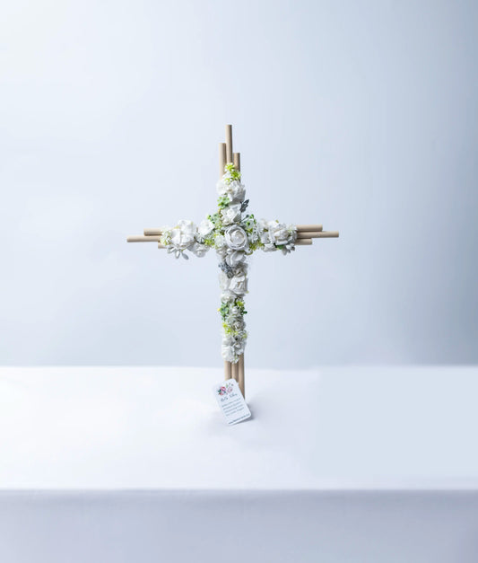 Handcrafted baptism cross for babies decorated with premium off-white lace, flowers, and pearl details.