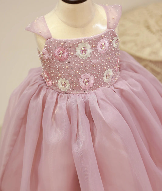 Close-up of the pastel lavender gown yoke showing the intricate handwork with pearls, sugar beads, and crystals
