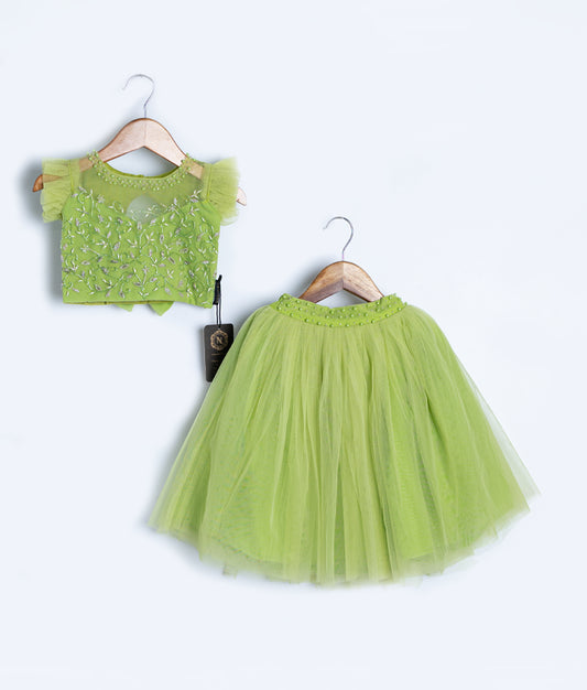 Lime green baby girl outfit featuring handcrafted crochet top with matching tulle skirt
