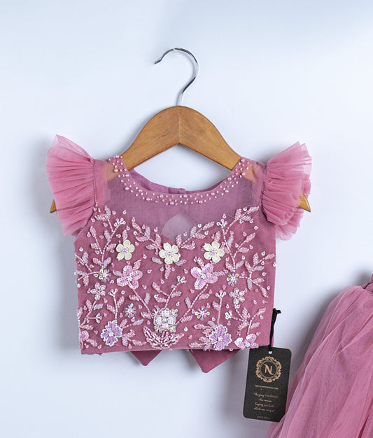 Mauve pink crochet lace top for baby girls with delicate floral pattern and scalloped edges