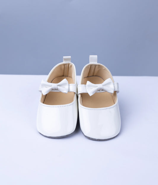 Nakshatra Kids style B26 white handcrafted baptism shoes, a premium ready-to-ship ceremony accessory for babies.