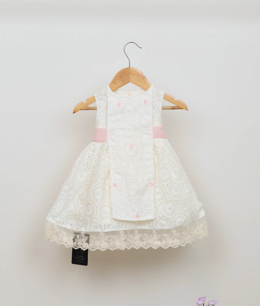 Off-white hacoba embroidery yoke sleeveless christmas dress for baby girls with a flared skirt and lace trim.