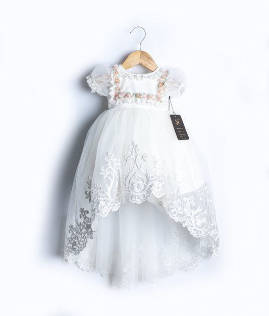 Premium off-white baby girl baptism frock featuring intricate hand-embroidery and elegant lace accents