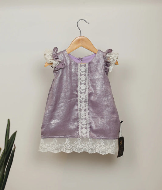 Pastel lavender Milan foil frock with ruffled sleeves and vertical lace trim for baby girls.