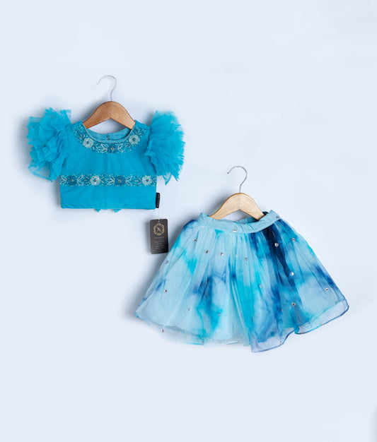 Turquoise blue baby girl dress with feathered sleeves and tie-dye skirt