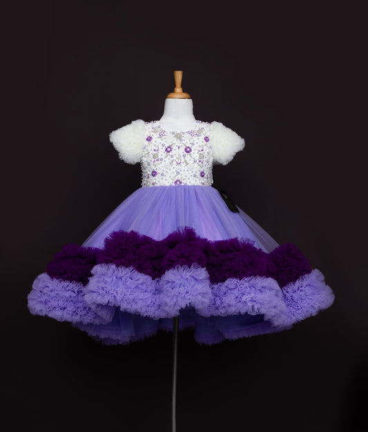 White and purple embroidered dress with tiered purple skirt and floral embroidered bodice for girls