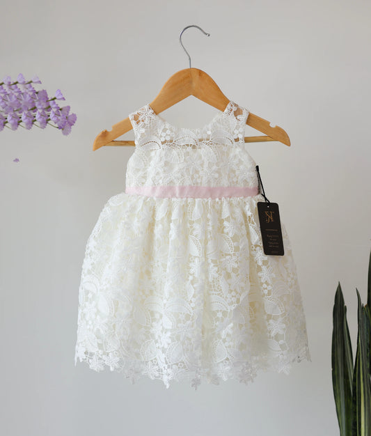 Front view of off-white crochet baptism frock for baby girl