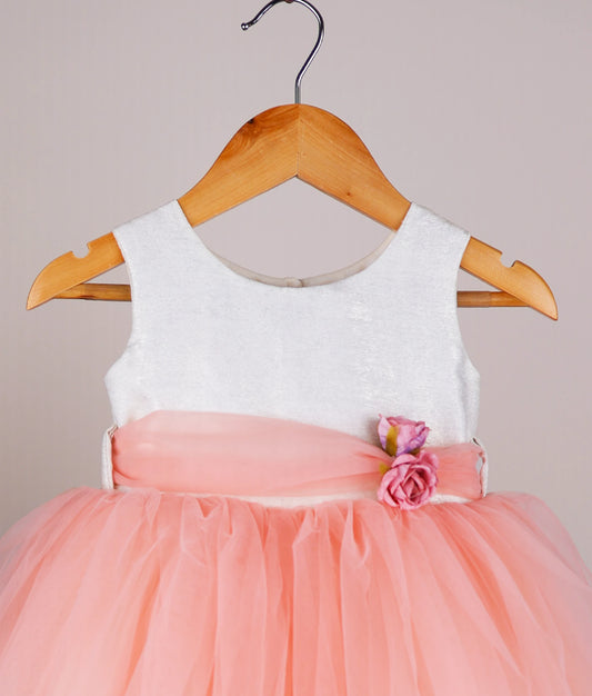 Close view of milan foil yoke with peach skirt birthday frock with white background