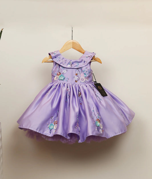 Front view of lavender flower-themed dress against white background