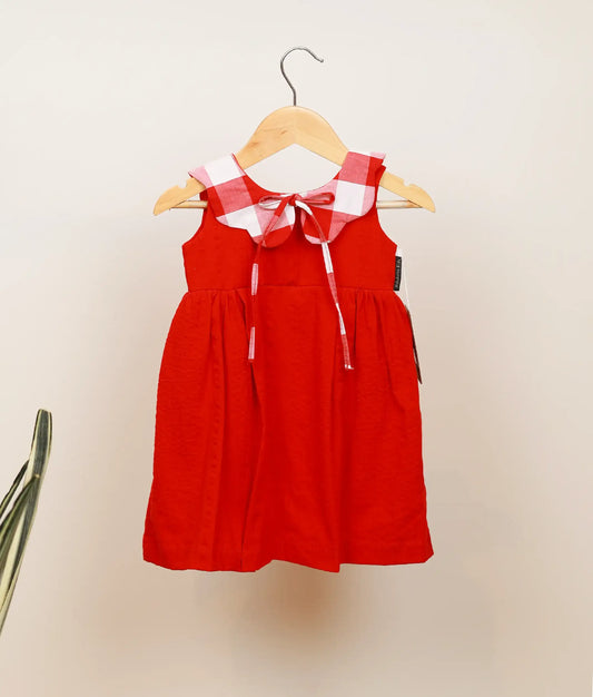 Front view of red cotton christmas frock for baby girl