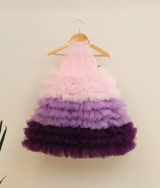 Front view of multi-color tulle net handworked step gown against plain background