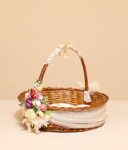 Multi-color flower Baptism Basket against plain background