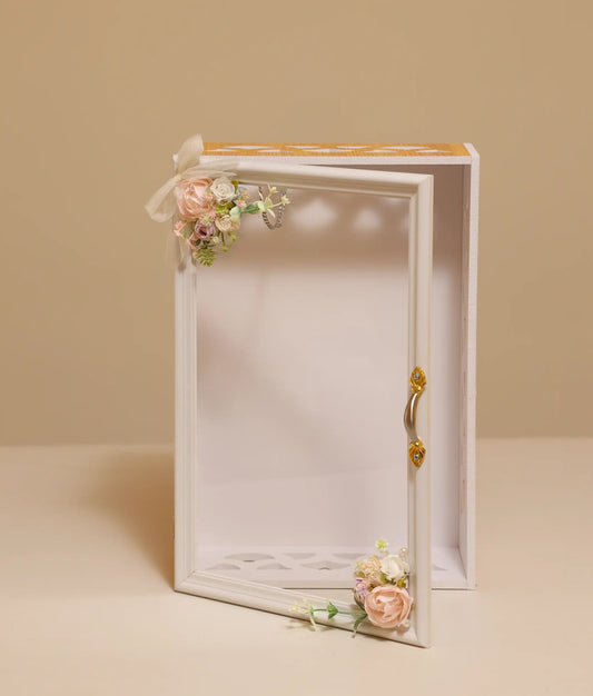 Multi-wooden decorative flower baptism box against plain background