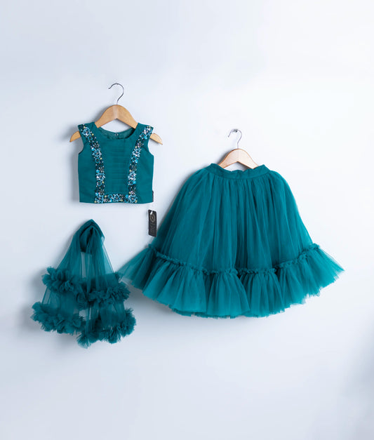 Peacock blue crop top and skirt set with an additional dupatta, displayed on hangers against a white background.