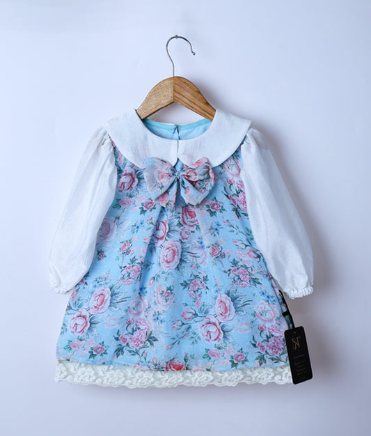 A blue linen casual frock displayed on a hanger against a white background.