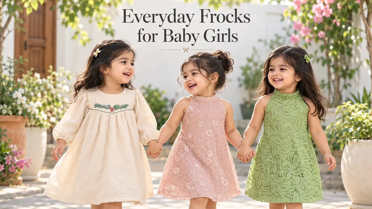 Baby girls wearing comfortable everyday frocks by Nakshatra Kids
