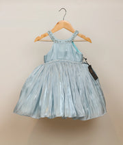 Front view of a powder blue lacer organza handworked birthday frock for baby girls featuring a beaded collar and flared skirt