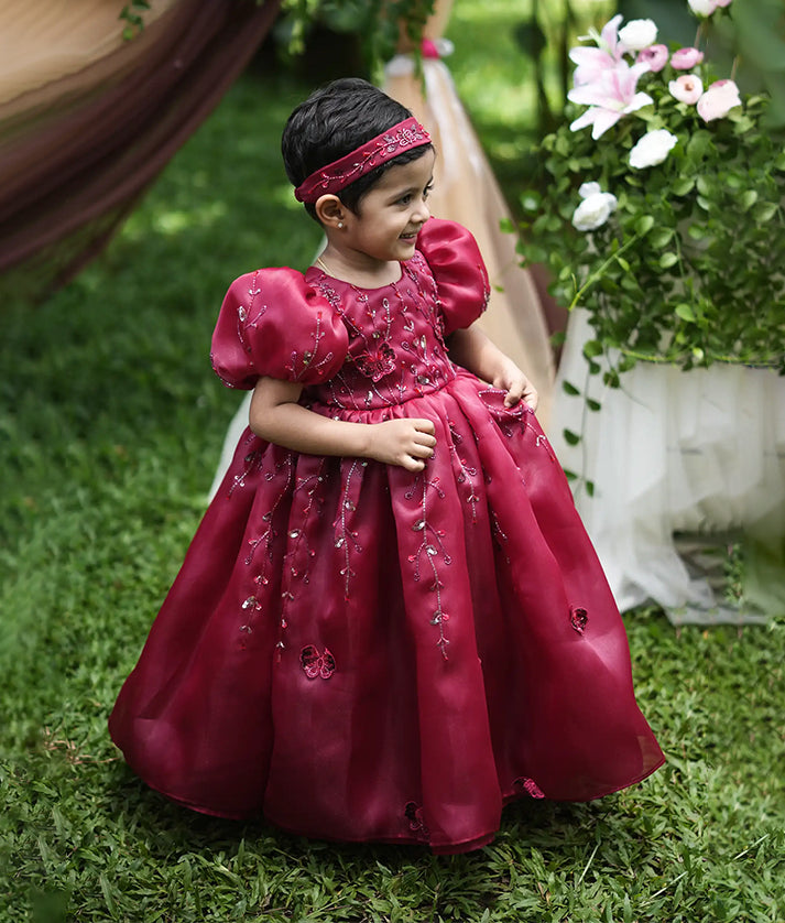 Baby girl wearing maroon plain organza handworked gown