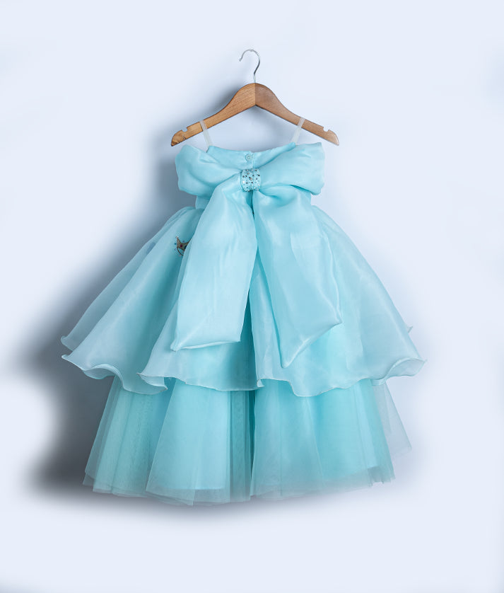 Back view of the pastel blue Disney princess gown highlighting the elegant off-the-shoulder strap design