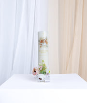 baptism candle decorated with premium off-white lace and delicate floral accents for a baby.