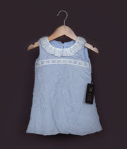 Sleeveless light blue birthday frock for baby girl with lace detailing