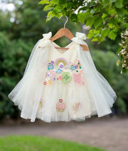Cream birthday frock for baby girl with colorful floral embroidery and tulle skirt