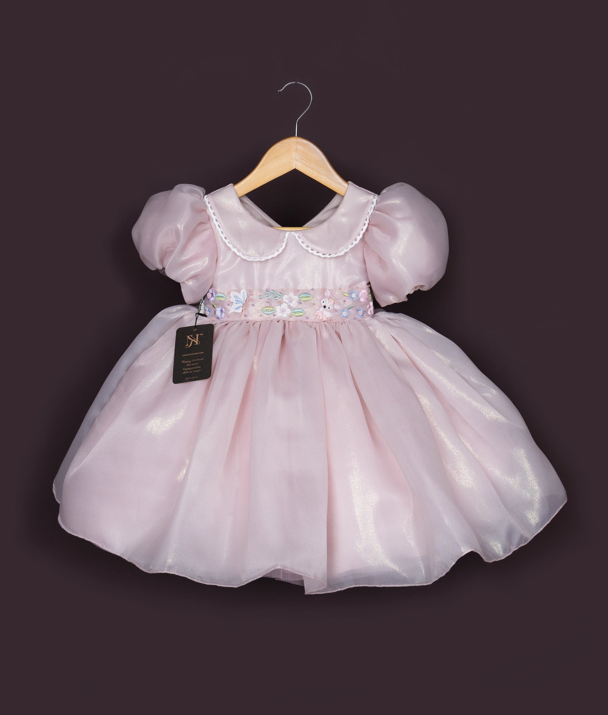 Birthday frock for baby girl with puff sleeves and satin bow in light pink