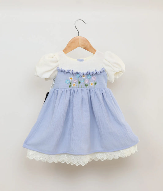 Blue linen frock with floral embroidery yoke and puffy sleeves for baby girls.