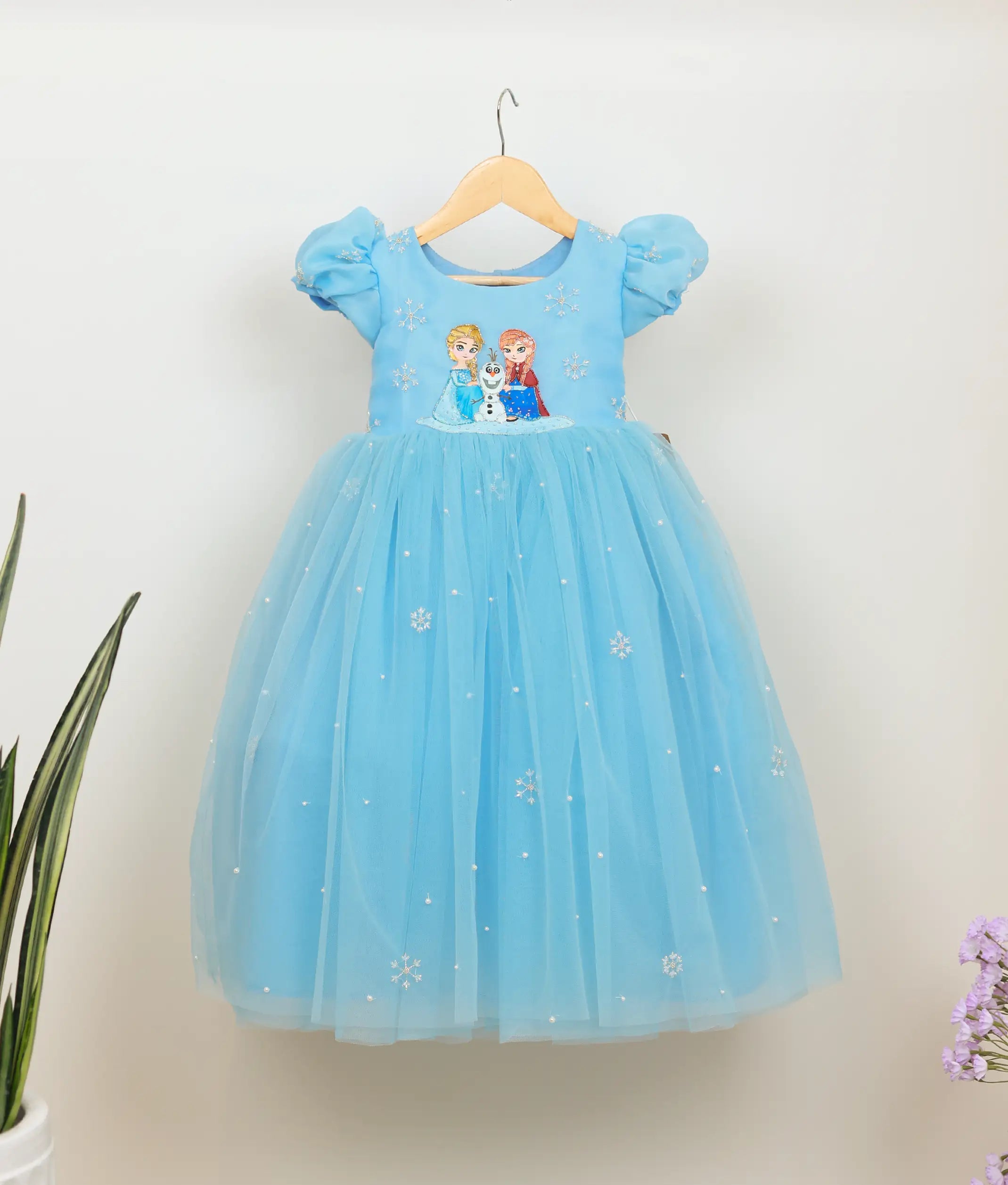 Front view of a blue tulle net hand-painted Frozen-theme birthday gown for girls with Elsa and Anna