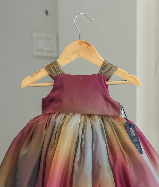 Close-up of the wine bodice, gathered straps, and the shimmering multi-shade laser organza fabric.
