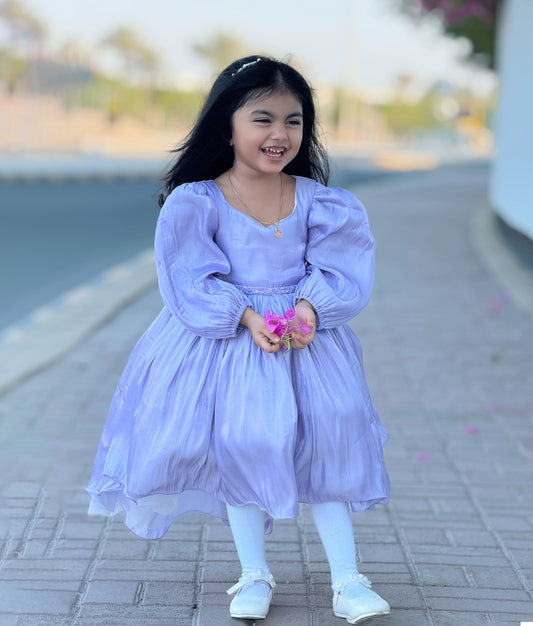 Close-up of the intricate beaded embroidery belt and laser organza fabric detailing on the lavender birthday dress