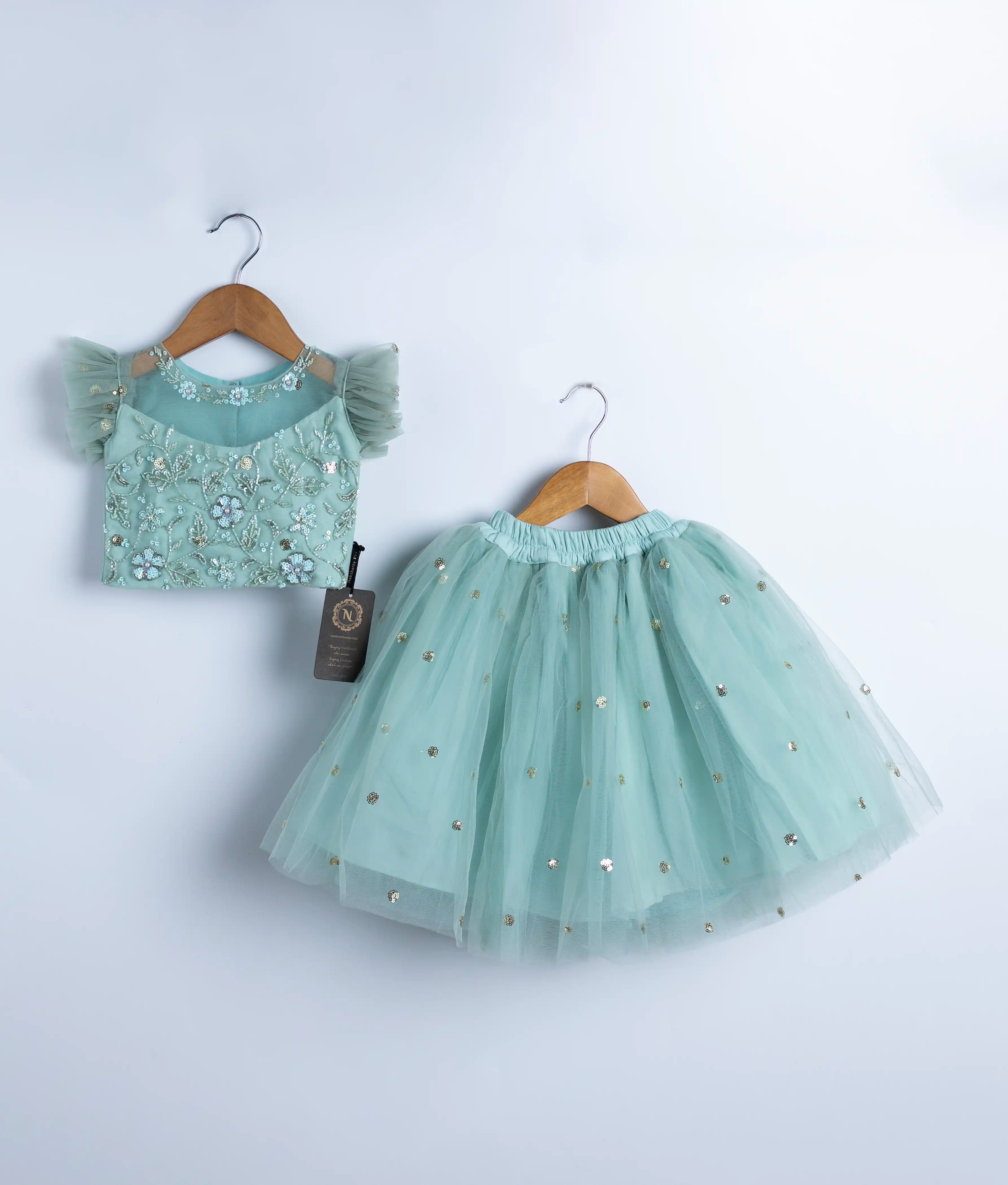 Handmade mint green baby girl outfit with sequin applique top and tulle skirt