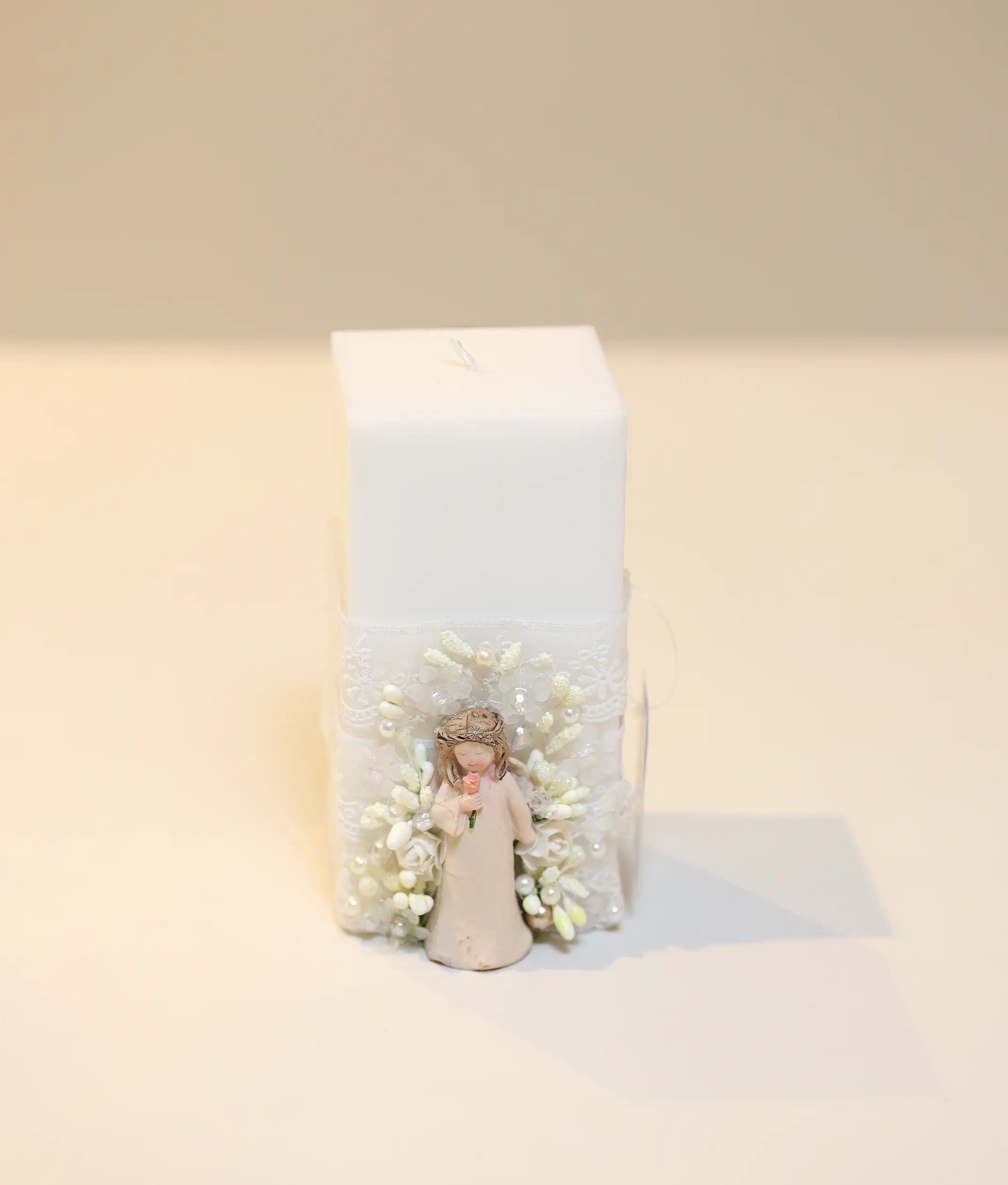 Angel-themed baptism pillar candle, handcrafted and ready for ceremony use