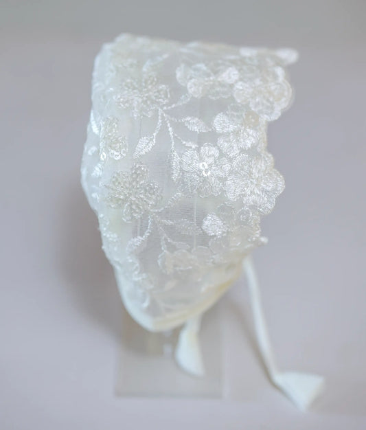 Elegant white baptism bonnet for infants, style CP06 from Nakshatra Kids, ready to ship.