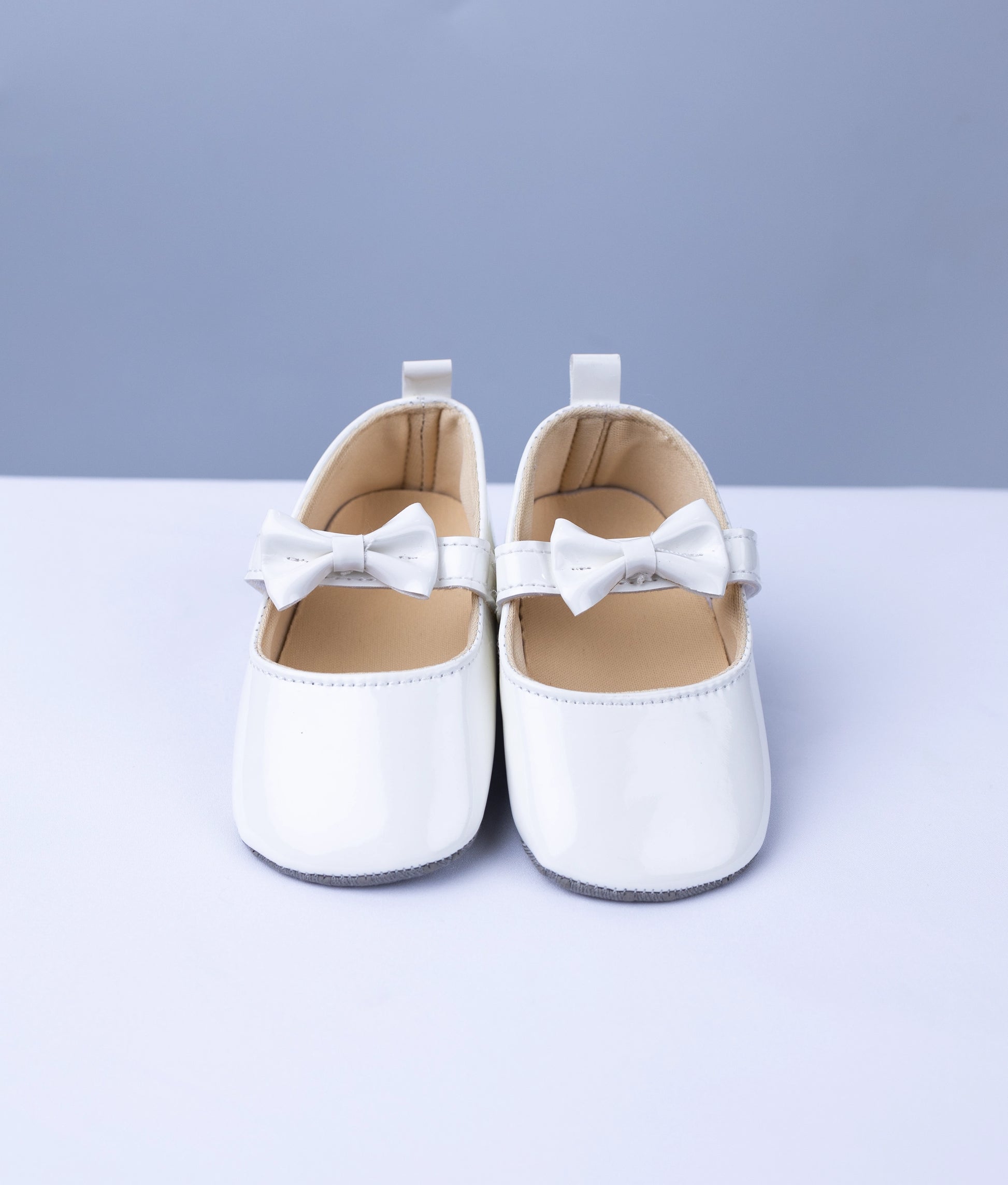 Nakshatra Kids style B26 white handcrafted baptism shoes, a premium ready-to-ship ceremony accessory for babies.