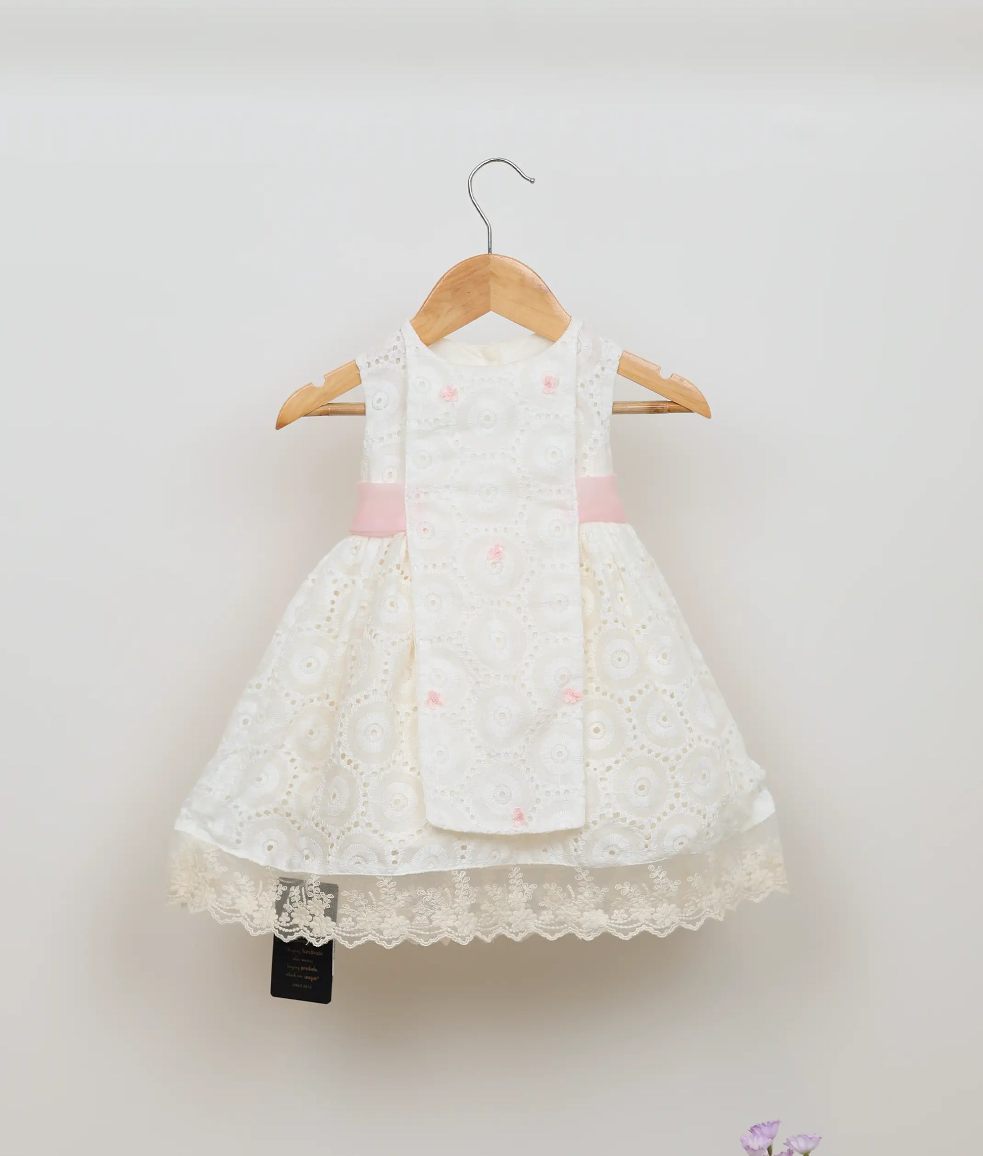 Off-white hacoba embroidery yoke sleeveless christmas dress for baby girls with a flared skirt and lace trim.
