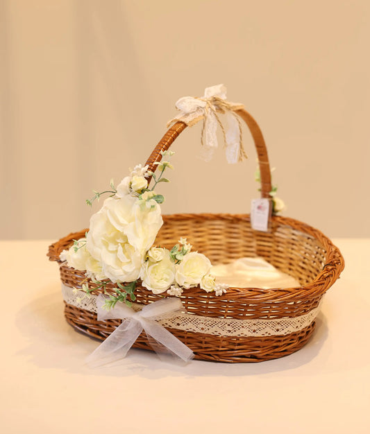 Off-white baptism basket with delicate lace trim and soft fabric lining for ceremony essentials.