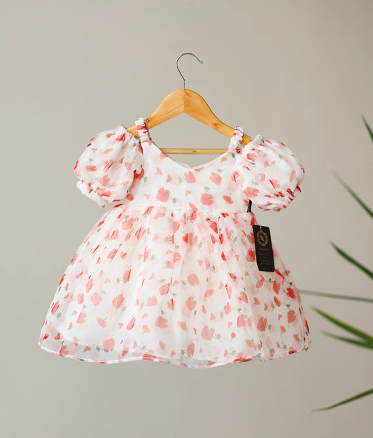 Off-white printed Organza frock with short puff sleeves and a smooth flared skirt for baby girls.