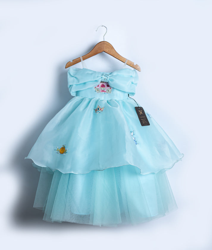 Front view of a pastel blue Disney princess theme birthday frock with a layered organza skirt and embroidered motifs
