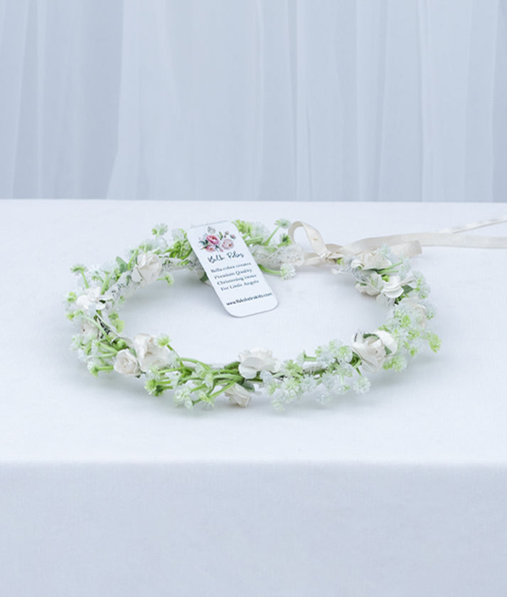 Delicate pastel shade floral baptism tiara for baby girls featuring handcrafted fabric blooms and a soft elastic band.