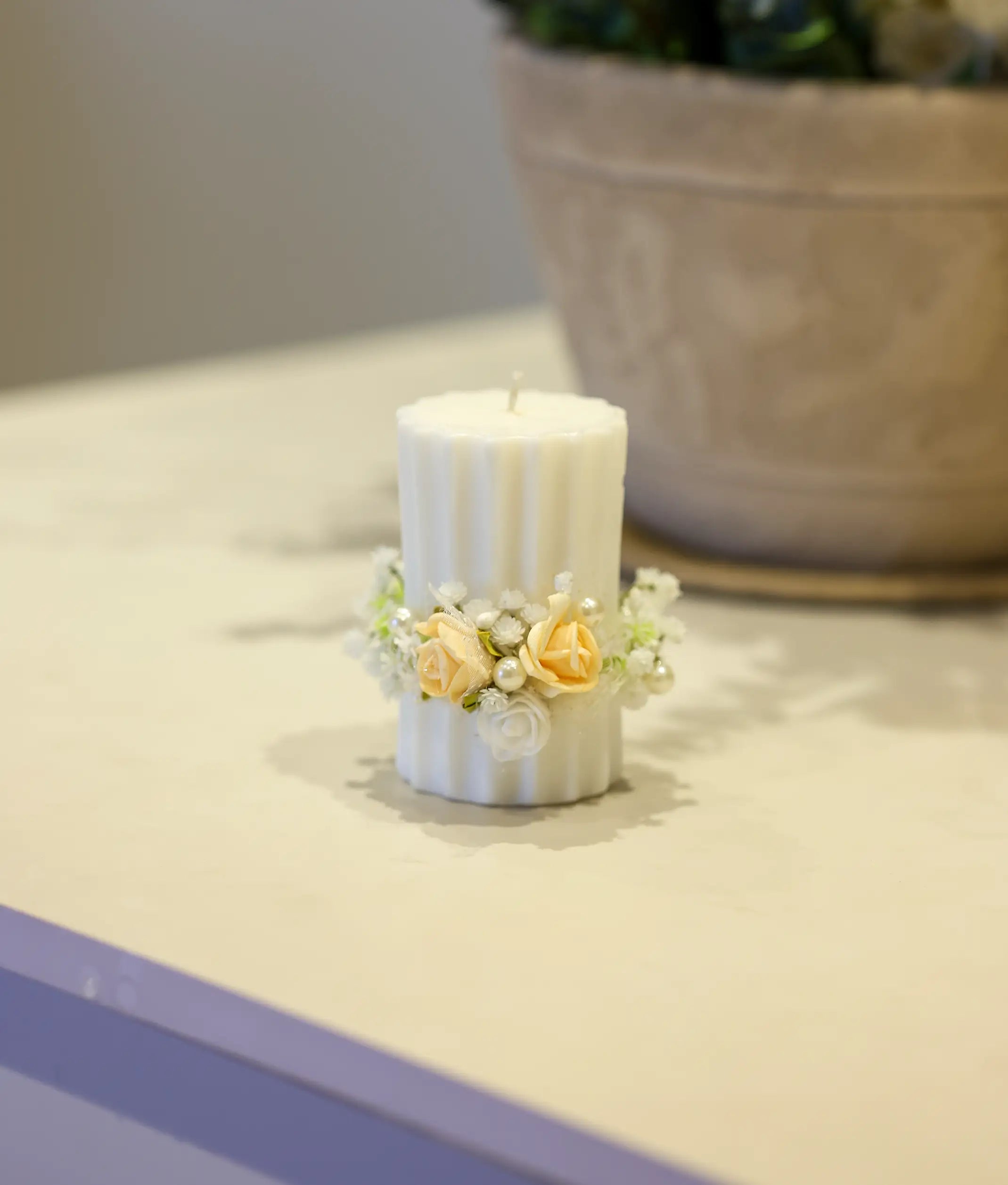 Peach and white floral pillar baptism candle for baby with handcrafted flower band and iridescent beads