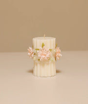 Peach floral pillar baptism candle for baby girl featuring silk flowers, white lace ruffles, and gold pearl accents
