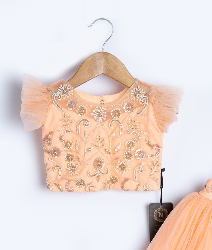 Coral peach cap sleeve top with gold star pattern for toddler girls, festive design