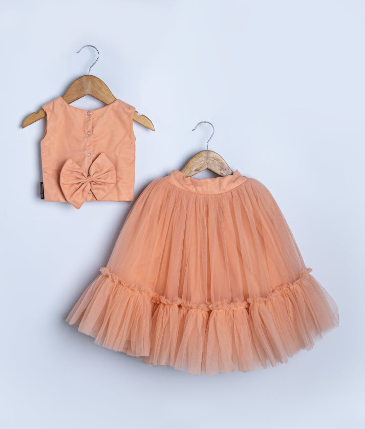 Peach colored tiered ruffle tulle skirt for baby girl formal events and special occasions