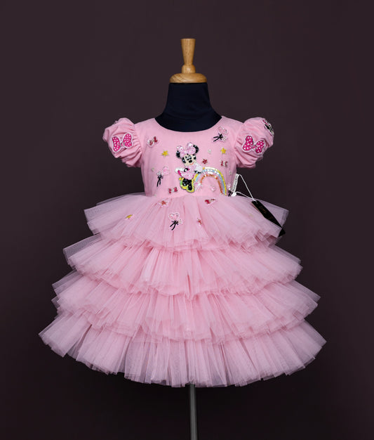 Pink baby girl dress with puff sleeves, Minnie Mouse sequin work, and layered net tulle skirt.